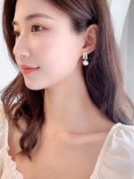 "A" Shape Pearl Drop Earrings - Image 2